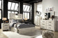 Cambeck Panel Bed With 2 Storage Drawers With Mirrored Dresser, Chest And 2 Nightstands at Lee Furniture, NC