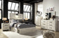 Cambeck Panel Bed With 2 Storage Drawers With Mirrored Dresser, Chest And Nightstand at Lee Furniture, NC