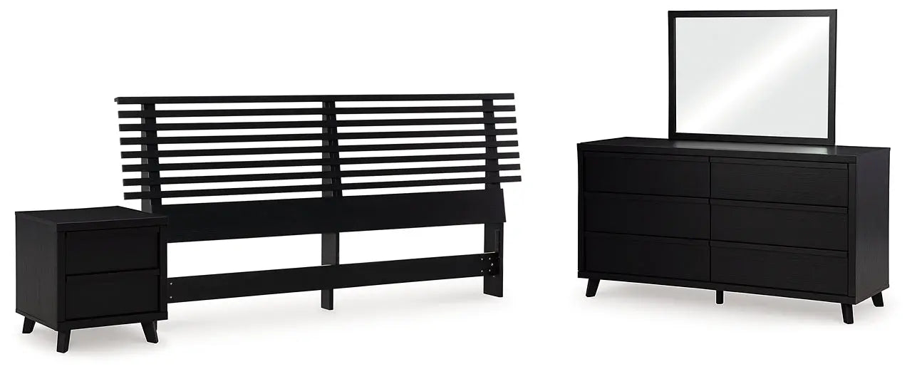 Danziar King Panel Headboard with Mirrored Dresser and Nightstand at Lee Furniture, NC