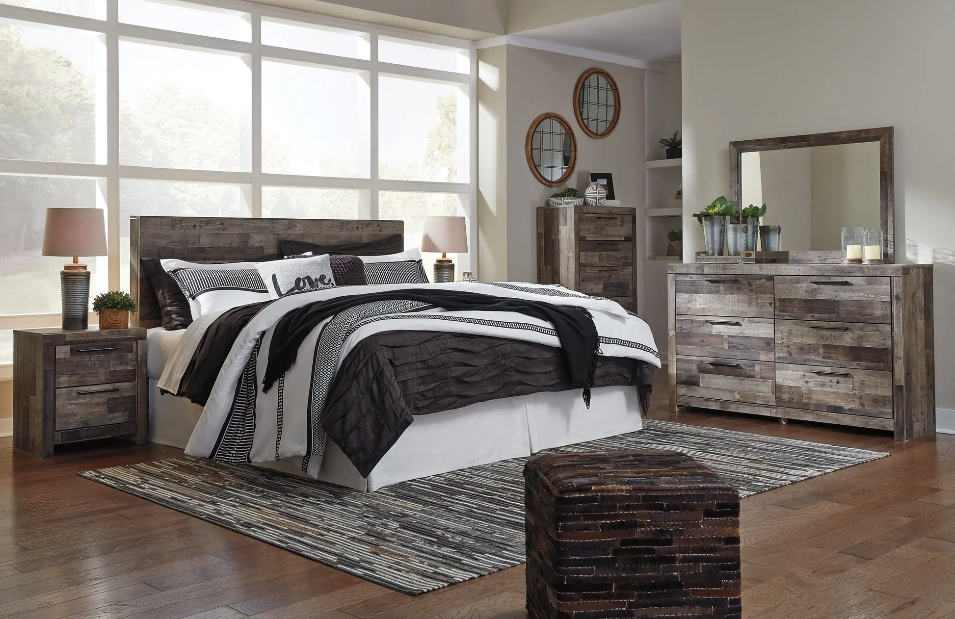Derekson King Panel Headboard with Mirrored Dresser, Chest and Nightstand at Lee Furniture, NC
