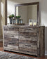 Derekson Queen Panel Bed with 4 Storage Drawers with Mirrored Dresser and Chest at Lee Furniture, NC