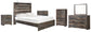 Drystan Panel Bed With Mirrored Dresser, Chest And 2 Nightstands at Lee Furniture, NC
