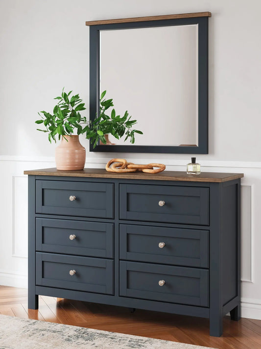 Landocken Dresser and Mirror at Lee Furniture, NC