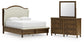 Sturlayne Queen Upholstered Panel Bed with Mirrored Dresser