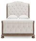 Ardenfield Queen Upholstered Sleigh Bed with Mirrored Dresser