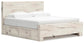 Lawroy King Panel Bed with Storage, Dresser, Mirror and Nightstand